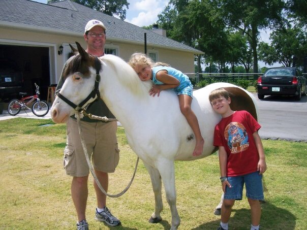 My+brother%2C+dad+and+I+loving+on+our+pony%2C+Pete%2C+while+living+in+Florida%21