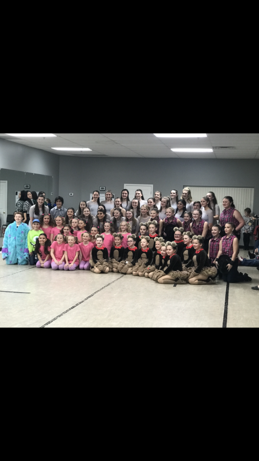 The Town and Village dancers in their costumes before dress rehearsal begins. 