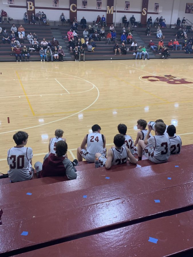 Eighth Grade team spaced out bench