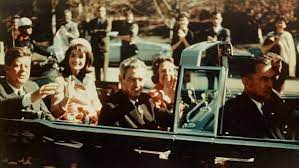 Kennedy with his wife, moments before he was shot. 