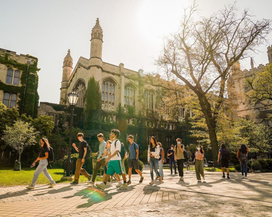 Students on the quadrangle in front of Stuart Hall. From the University of Chicago Facebook page