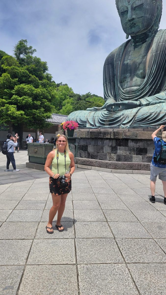 This is a photo of Ms. Alexandria Daniel in Japan at the Great Buddha statue.