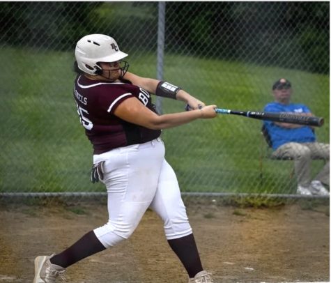 Miranda Sexton swinging during one of her games in the year 2021-2022