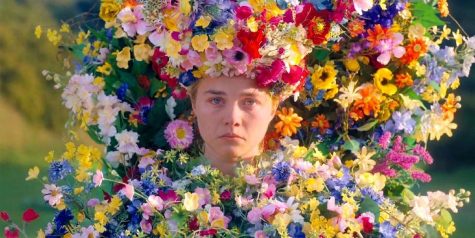  Dani Ardor (Florence Pugh) looks disoriented and in pain as her former boyfriend is chosen, stuffed into a carcass of a bear and burned in a temple.