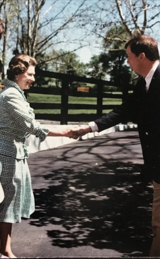 Gus Koch shaking Queen Elizabeth IIs hand. 