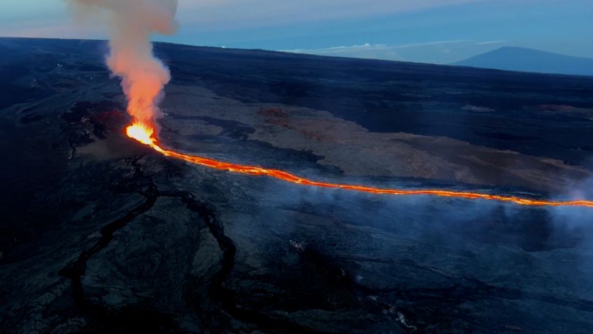 Lava from the Mauna Loa creeps towards a major highway.
