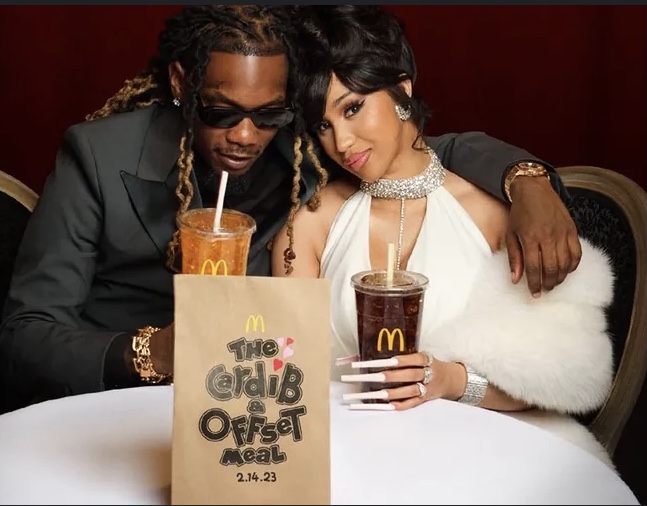 A picture of Off-set and Cardi B holding their McDonalds meal. 