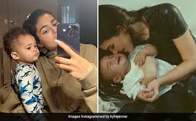 Kylie posing in pictures with her youngest child Aire Webster. 
