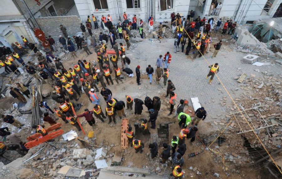After a suicide bomb on January 30, 2023, rescue workers looked for survivors in the rubble.