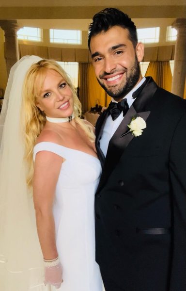 Britney Spears photographed standing next to husband Sam Asghari during their June wedding at Spears Thousand Oaks home in California.