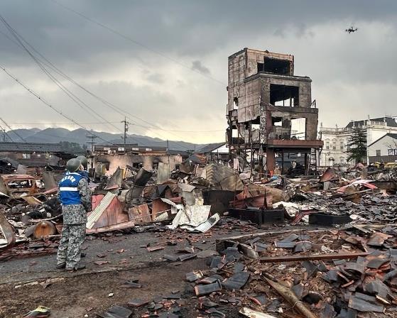 JSDF (Japanese Self Defense Force) image of a ruined building near Wajima
