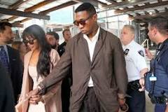 Jonathan Majors and Meagan Good leave court holding hands after hearing his trial about his domestic violence case.