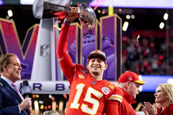 Patrick Mahomes holding up his third Lombardi trophy in 5 years. 