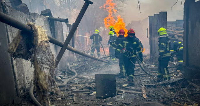 Ukrainian firefighters battle fires caused by Russian missiles in Odessa.