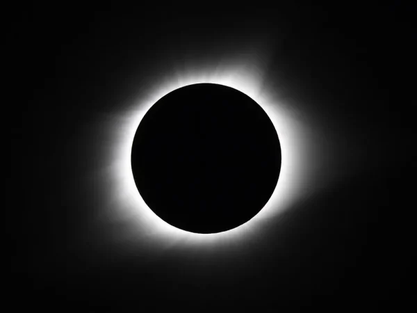 A total solar eclipse is when the Moon passes between the Earth and the Sun.