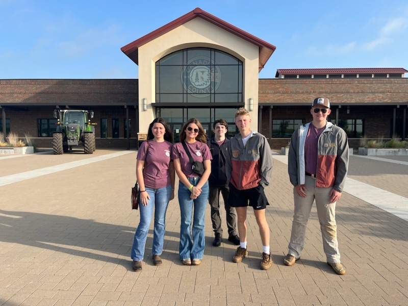 The 2023-2024 bourbon county  Landjudging team in front of the Canadian county expo and event center in Oklahoma. 
(Cole Nicoles far right)(Dixie Barnet far left) (Sydnie wells left middle) ( Case Davis right middle) and (Joseph sapp middle back) 