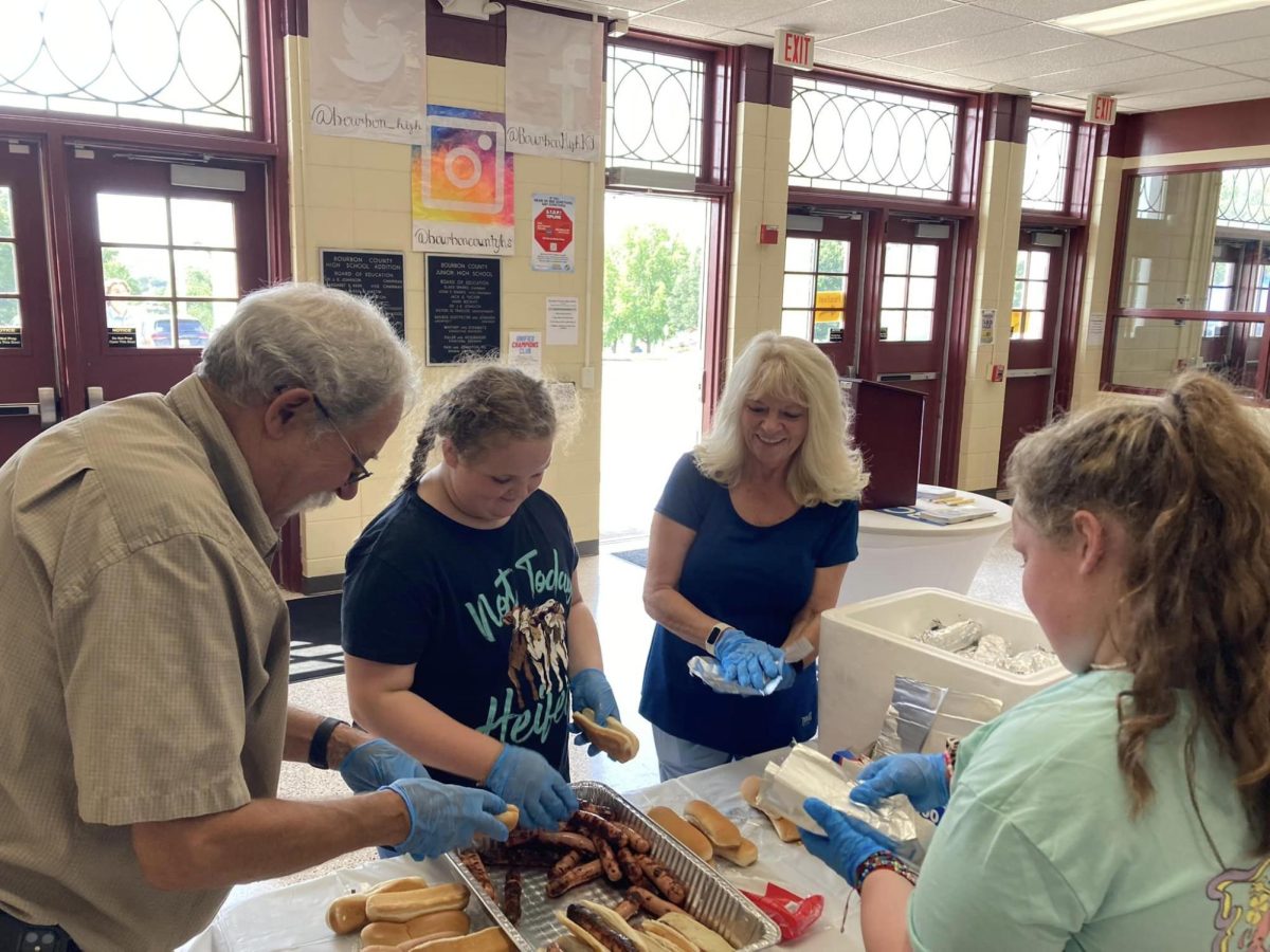 This is a photo of the First Baptist Church assisting at Readifest hosted at Bourbon County High School.