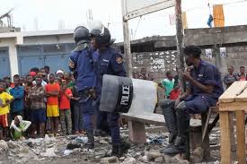 This image made from video shows police officers outside Makala prison in Kinshasa, Democratic Republic of the Congo, following an attempted jailbreak in Congo's main prison Monday Sept. 2, 2024.