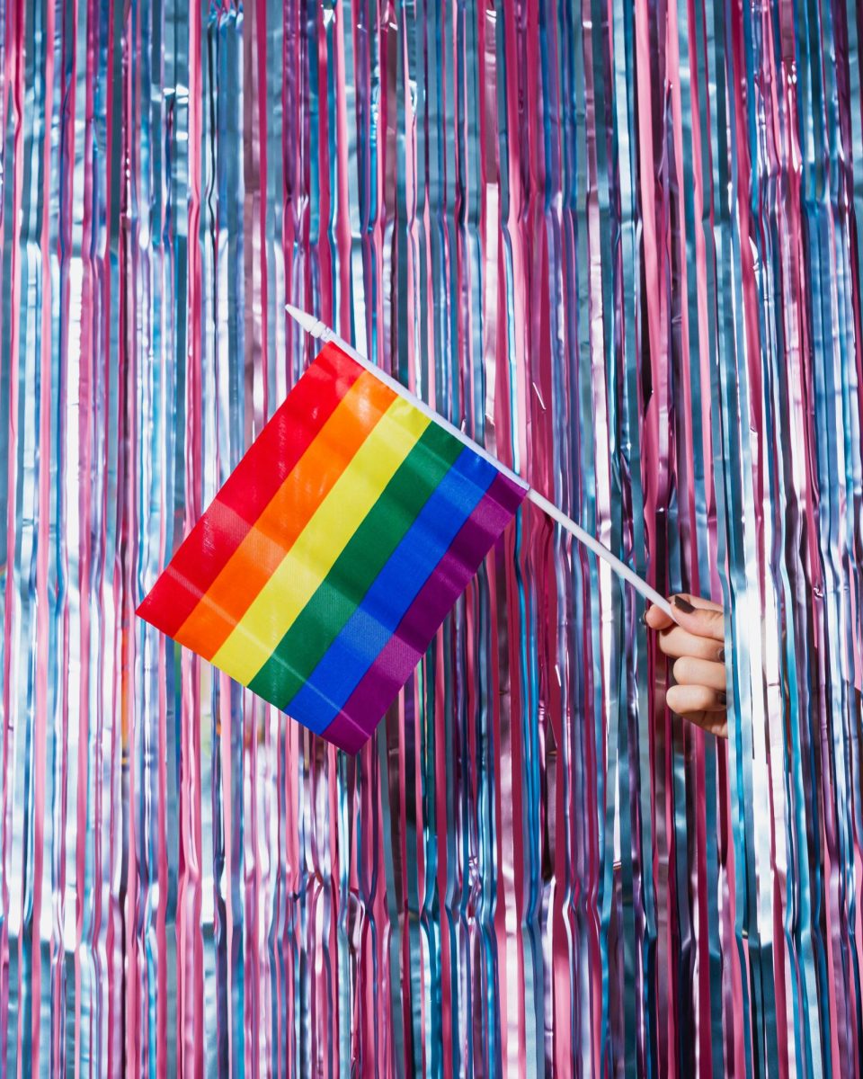 An image of the common marketed LGBTQ+ flag, a symbol of queer identity. 