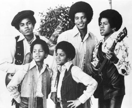 The Jackson 5: Michael, front right; Marlon, front left; Tito, back left; Jackie, back center; and Jermaine, back right pose for this undated photo together in Los Angeles.