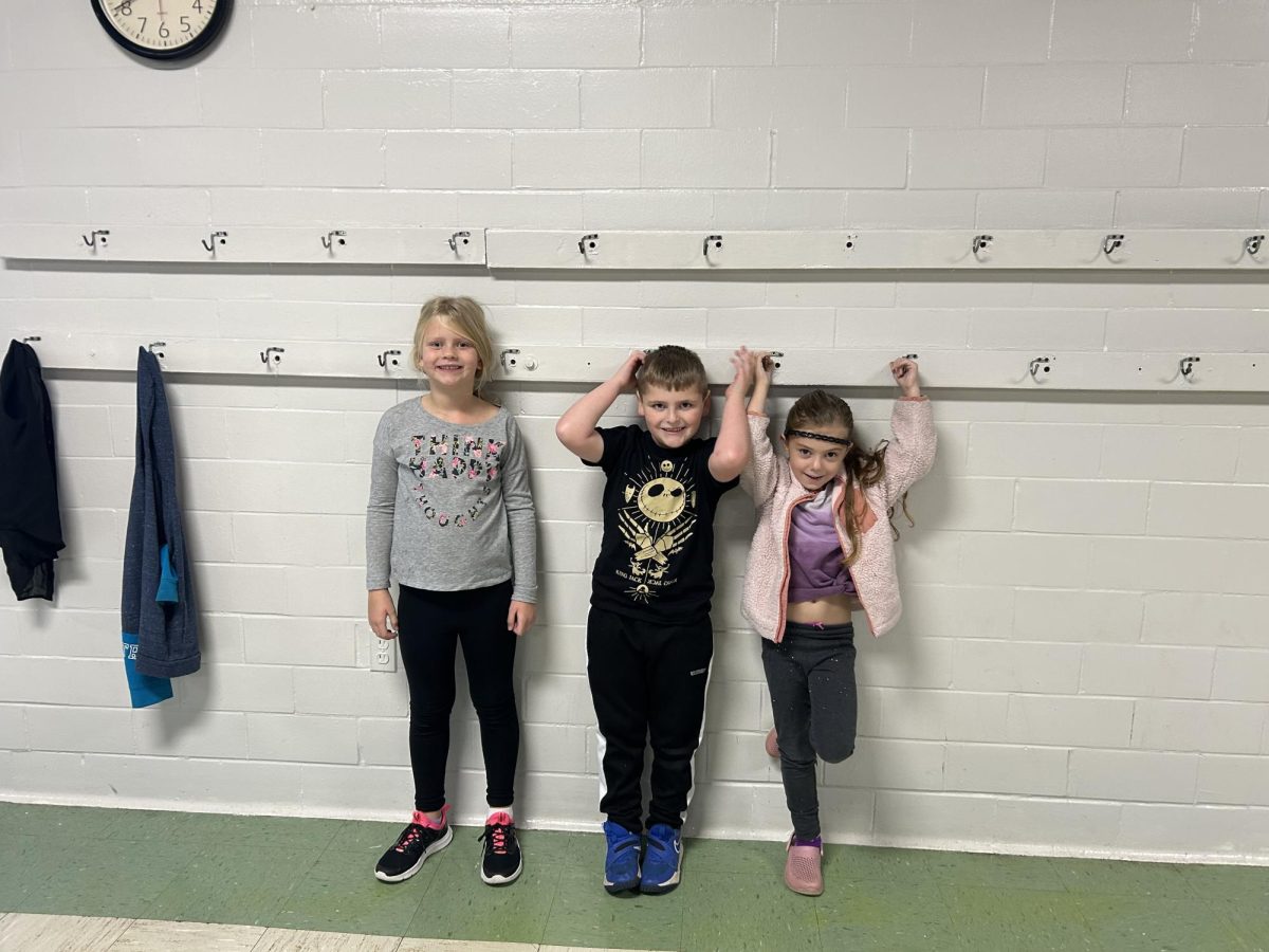 This is a photograph of three students from North Middletown Elementary School.